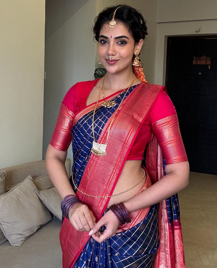 Blue zari checked with annam chakram buttas silk saree, contrast border of thilakam mokku, iruthalai pakshi, and ara maadam designs, and jaal pallu