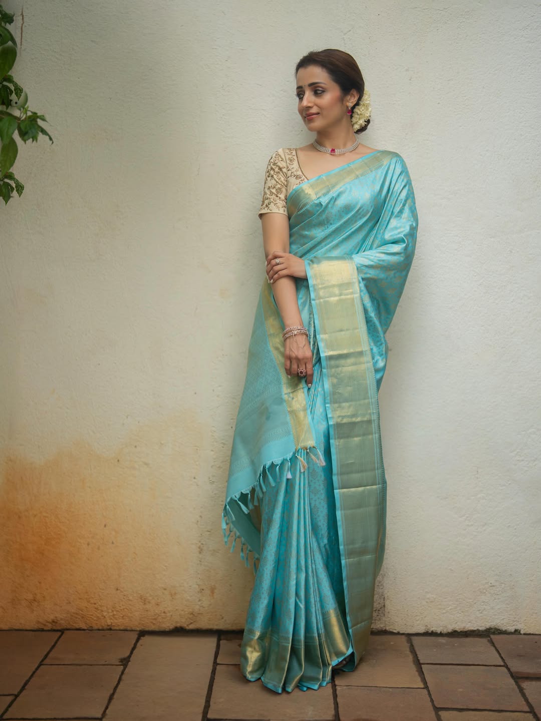 Blue Samudrika Silk Saree, Steeped in the Richness of Zari Buttas All Over Its Body, Highlighted by a Zari Border of Thilakam Mokku, Banaras, Muthu, Lathir, and Mayil Kann Designs, Gleaming Grand Pallu, and Paired with a Matching Blouse