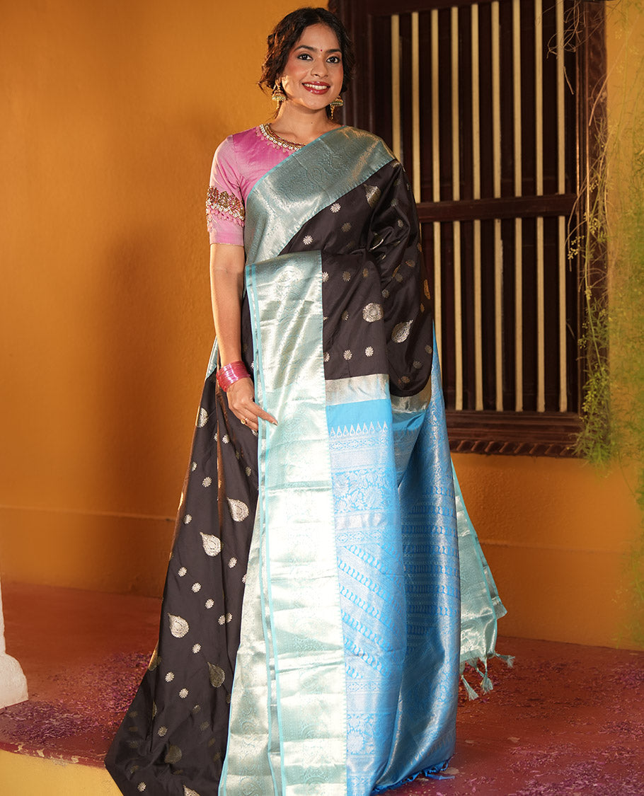 Black and Light Blue Budget Silk Saree, Ornamented with Zari Buttas on Its Body, Complemented by a Contrast Traditional Zari Design Border of Paisleys, Pallu Steeped with Paisley Designs, and Paired with a Contrast Blouse