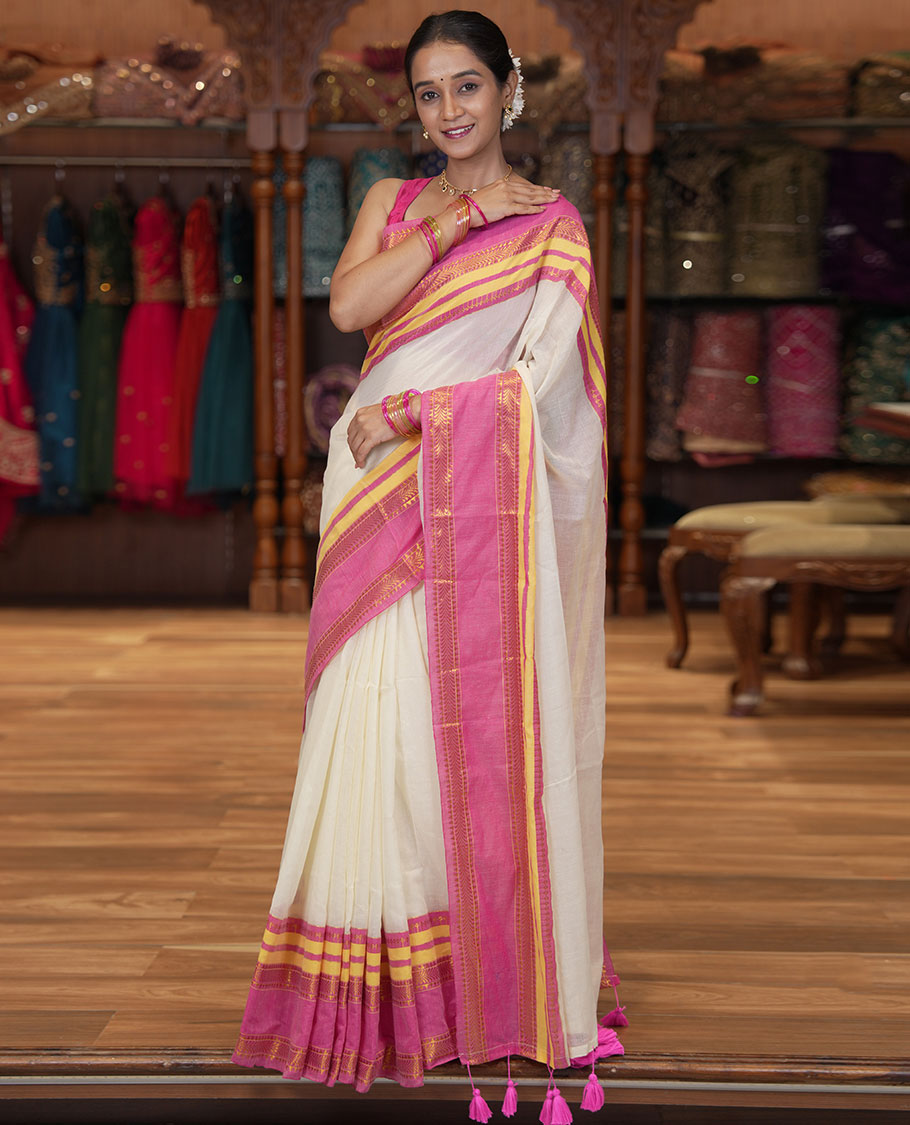 Cream Plain Khadi Mul Cotton Saree, Complemented by a Contrast Traditional Zari Varisai Pettu Border, and a Matching Blouse