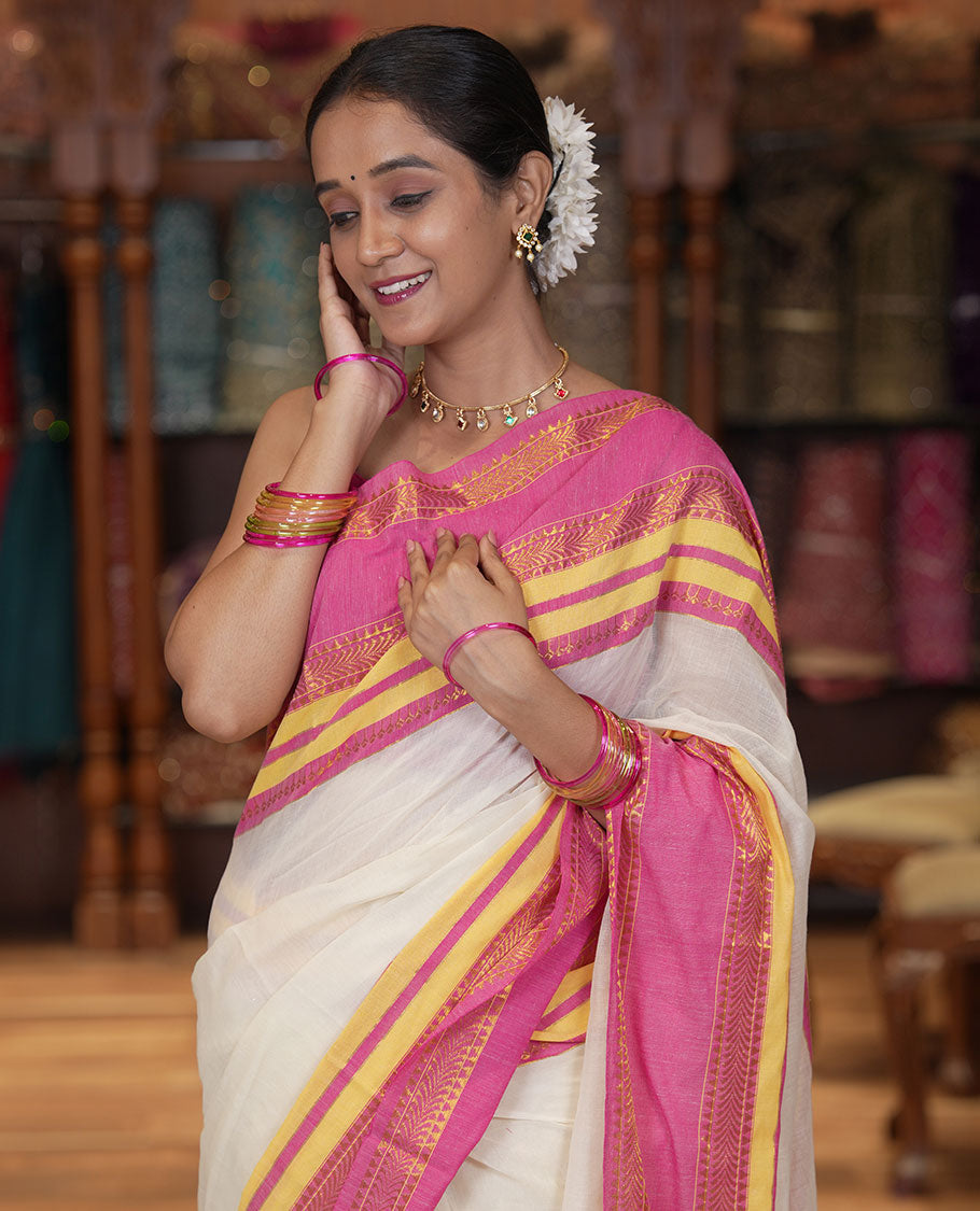 Cream Plain Khadi Mul Cotton Saree, Complemented by a Contrast Traditional Zari Varisai Pettu Border, and a Matching Blouse