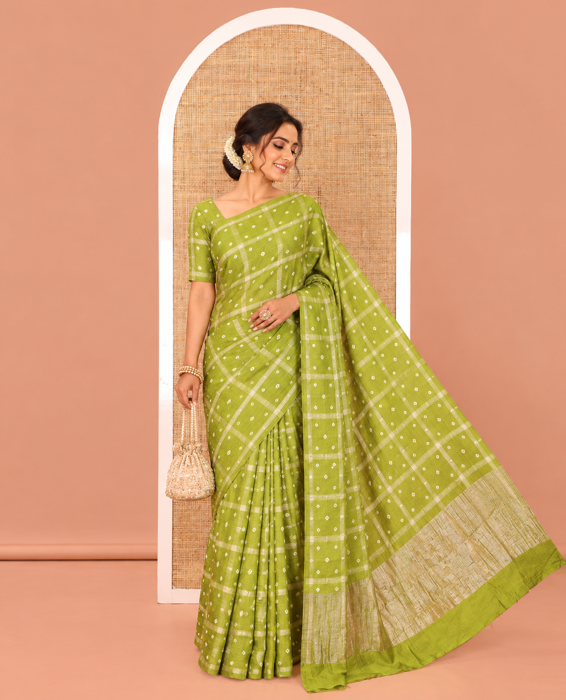 Borderless Green Assam Silk Saree, Richly Detailed with Bandhani-Dotted Ghar Chola Design on Its Body, Gleaming Zari Pallu, and Paired with a Matching Blouse