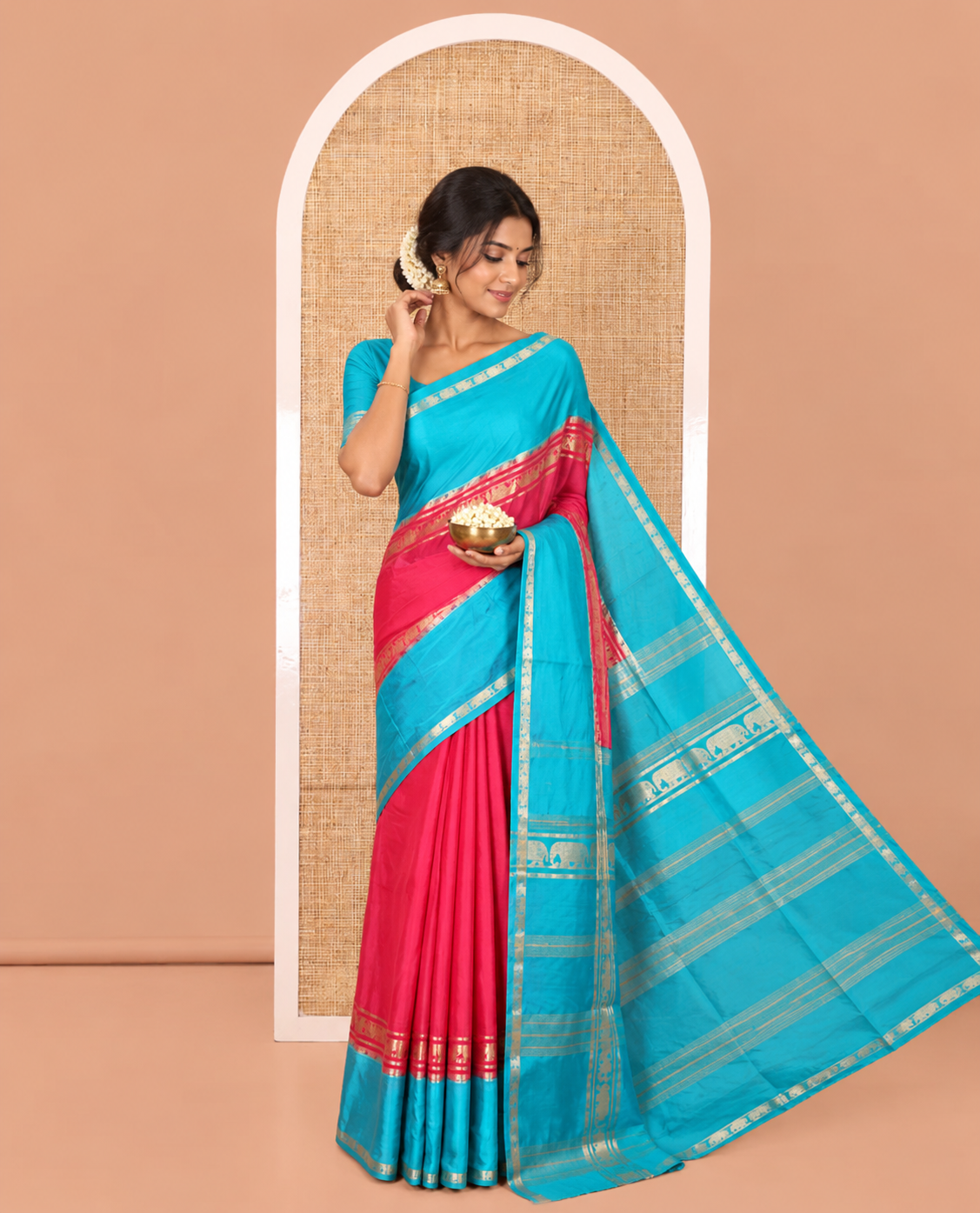 Pink Plain Art Mysore Silk Saree, Complemented by Captivating Contrast Rettai Pettu Traditional Border of Elephant Zari Buttas, Striped Pallu, and Paired with a Contrast Blouse