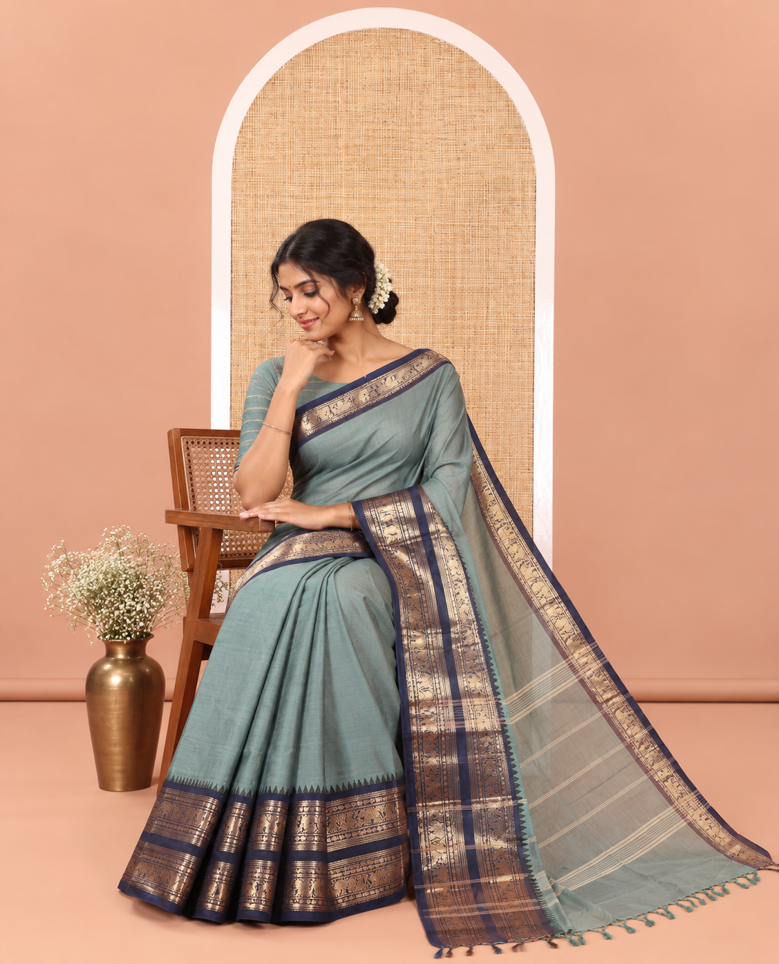 Green Plain Chettinad Cotton Saree, Complemented by a Contrast Traditional Zari Border of Peacock and Elephant Designs, Subtly Striped Pallu, and Paired with a Matching Blouse