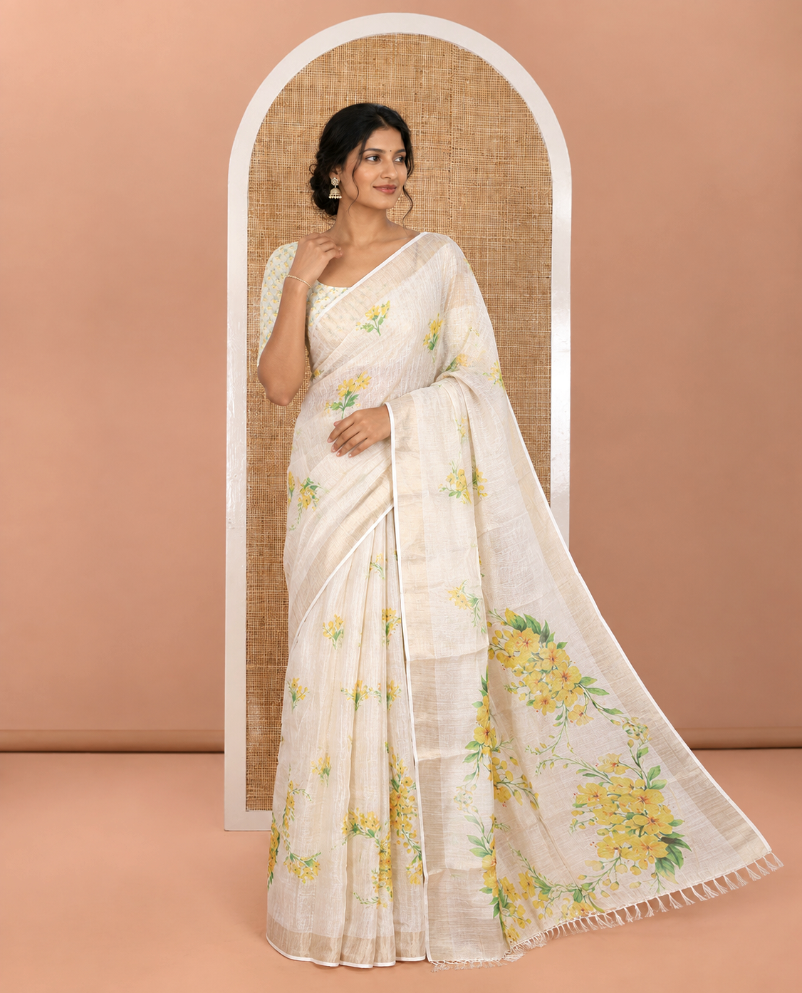 Cream Tissue Saree, Prettified with Yellow Floral Motifs Printed All Over Its Body, Subtle Bavanji Border, Pallu Features Floral Print, and Paired with a Matching Floral Printed Blouse