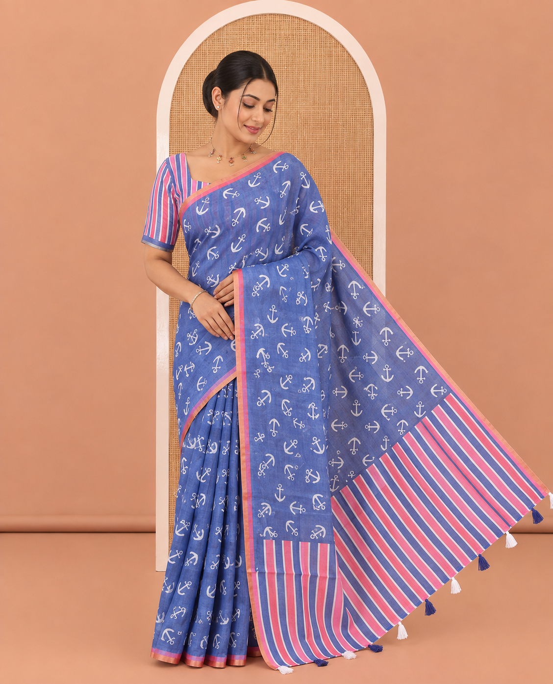 Royal Blue Linen Cotton Saree, Adorned with Anchor Motifs Printed on Its Body, a Subtle Contrast Piping Border, Multi-Color Striped Pallu, and Paired with a Contrast Blouse