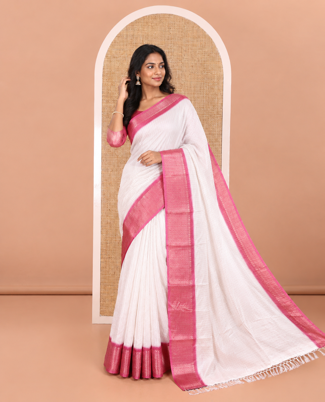 White and Pink Dola Silk Saree Bedecked with Vertical Zari Stripes All Over the Body, Complemented by a Contrast Border of Traditional Zari Designs, Self-Pallu of Stripes, and Paired with a Contrast Blouse