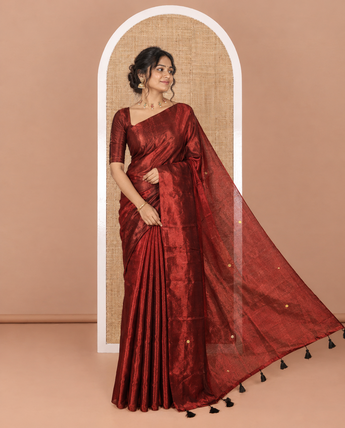 Borderless maroon mirror work khadi tissue saree, mirror work pallu, and a matching blouse