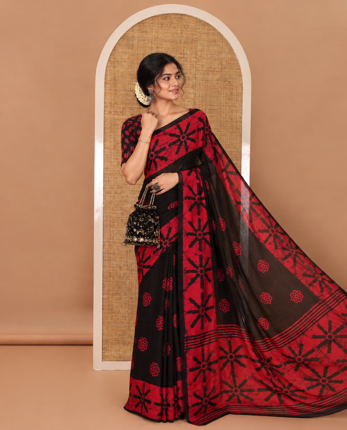 Black handblock wax batik printed georgette saree, star-like motifs handblock wax batik printed border & pallu & matching printed blouse