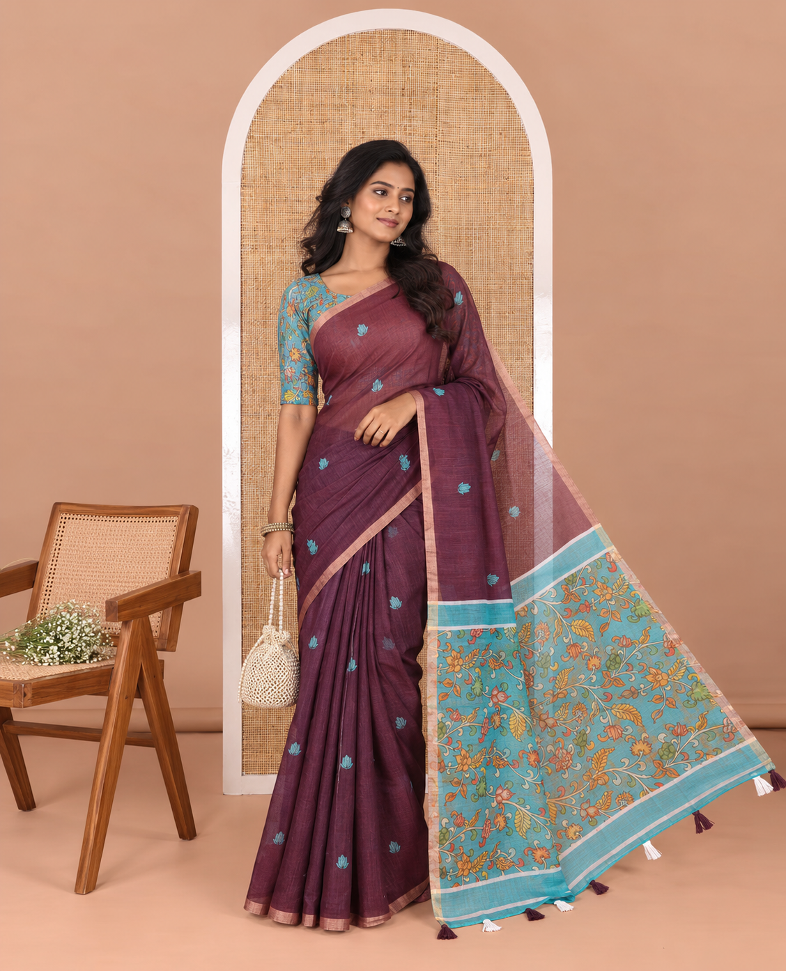 Wine lotus motifs printed linen saree, piping border, contrast floral vine printed pallu, and contrast printed blouse