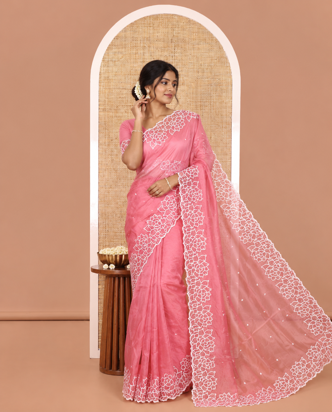 Pink Organza Saree, Subtly Sparkled with Embroidered Buttas Across Its Body, Highlighted by a Scallop Floral Thread Embroidered Border, a Self-Pallu, and Paired with a Matching Blouse