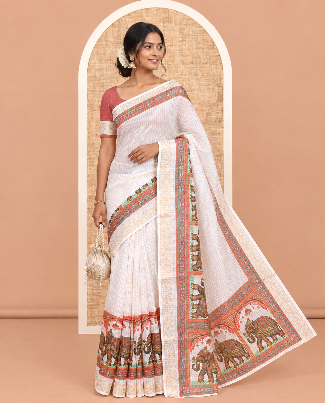 Cream Semi-Tussar Saree Features Checks and Elephant Print, a Paisley Zari Border, and a Contrast Blouse