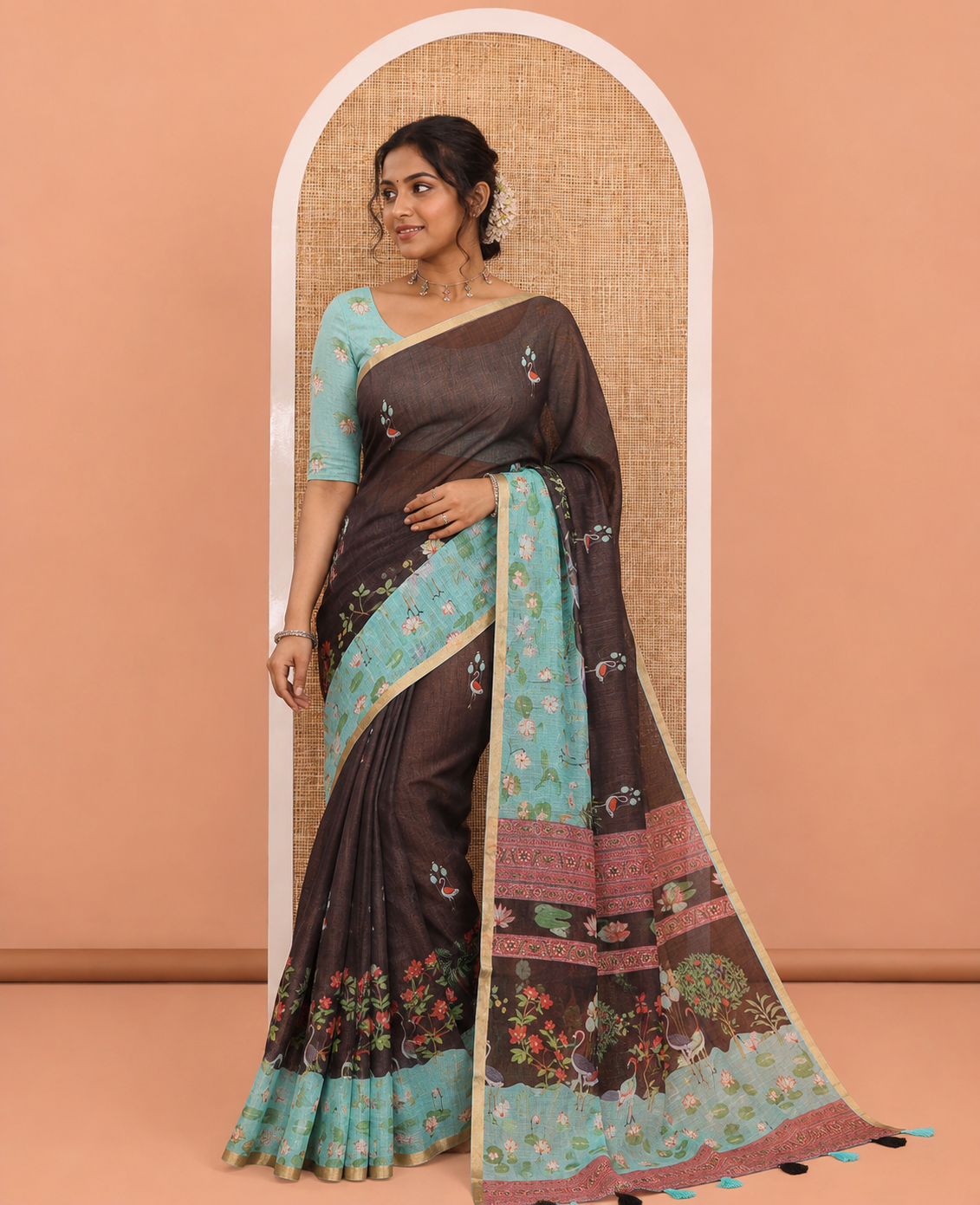 Black Linen Cotton Saree, Prettified with Crane and Floral Printed on Its Body, Subtle Piping Border, Captivating Contrast Pallu of Floral, Pichwai Lotus and Bird Designs, and Paired with a Contrast Blouse