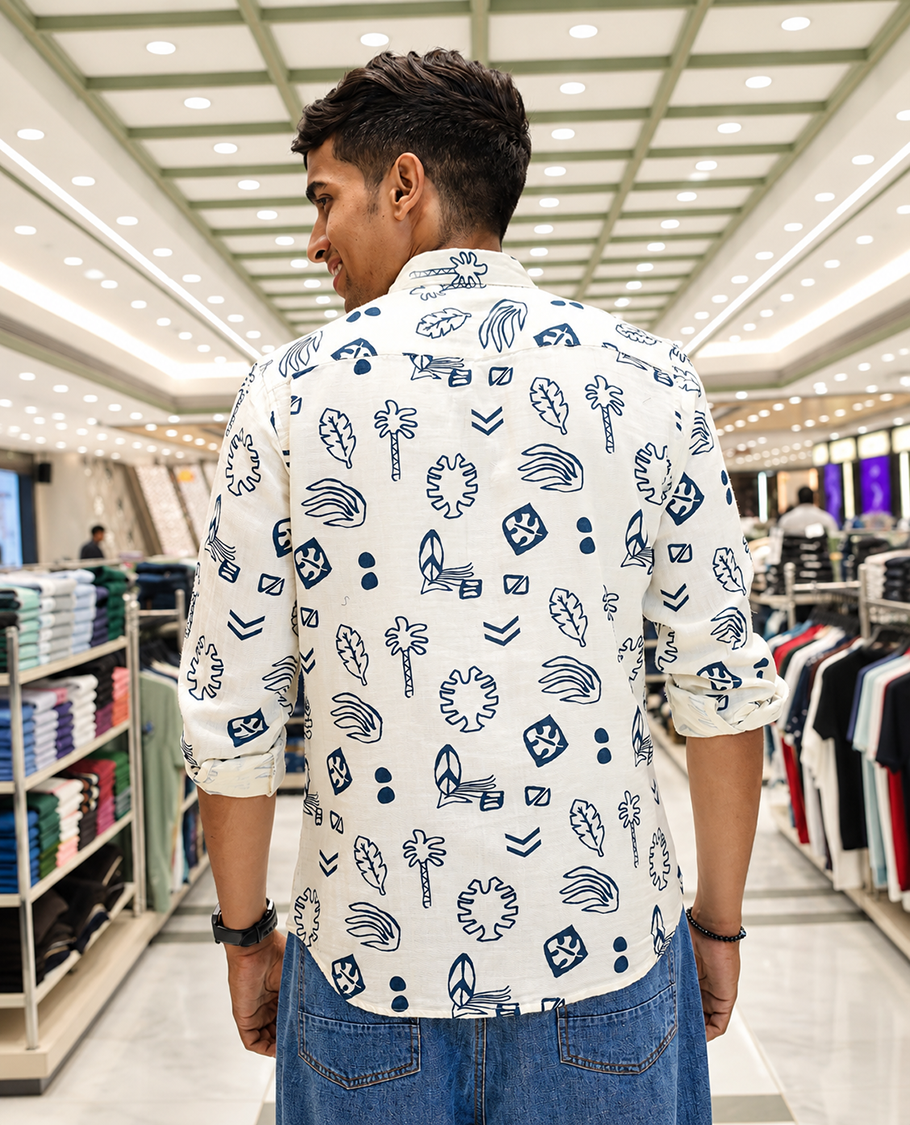 Cream-Blue Cotton-Blended Casual Shirt, Uniquely Printed with Tropical Flora-Theme Motifs, Featuring a Spread Collar, Full Sleeves, Slim Fit, and Regular Length