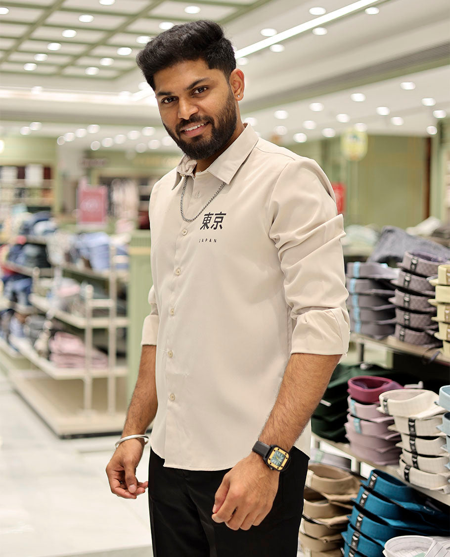 Cream Cotton-Blended Casual Shirt Features Typographic Print, Full-Sleeves, a Spread Collar, a Regular Fit, and a Regular Length