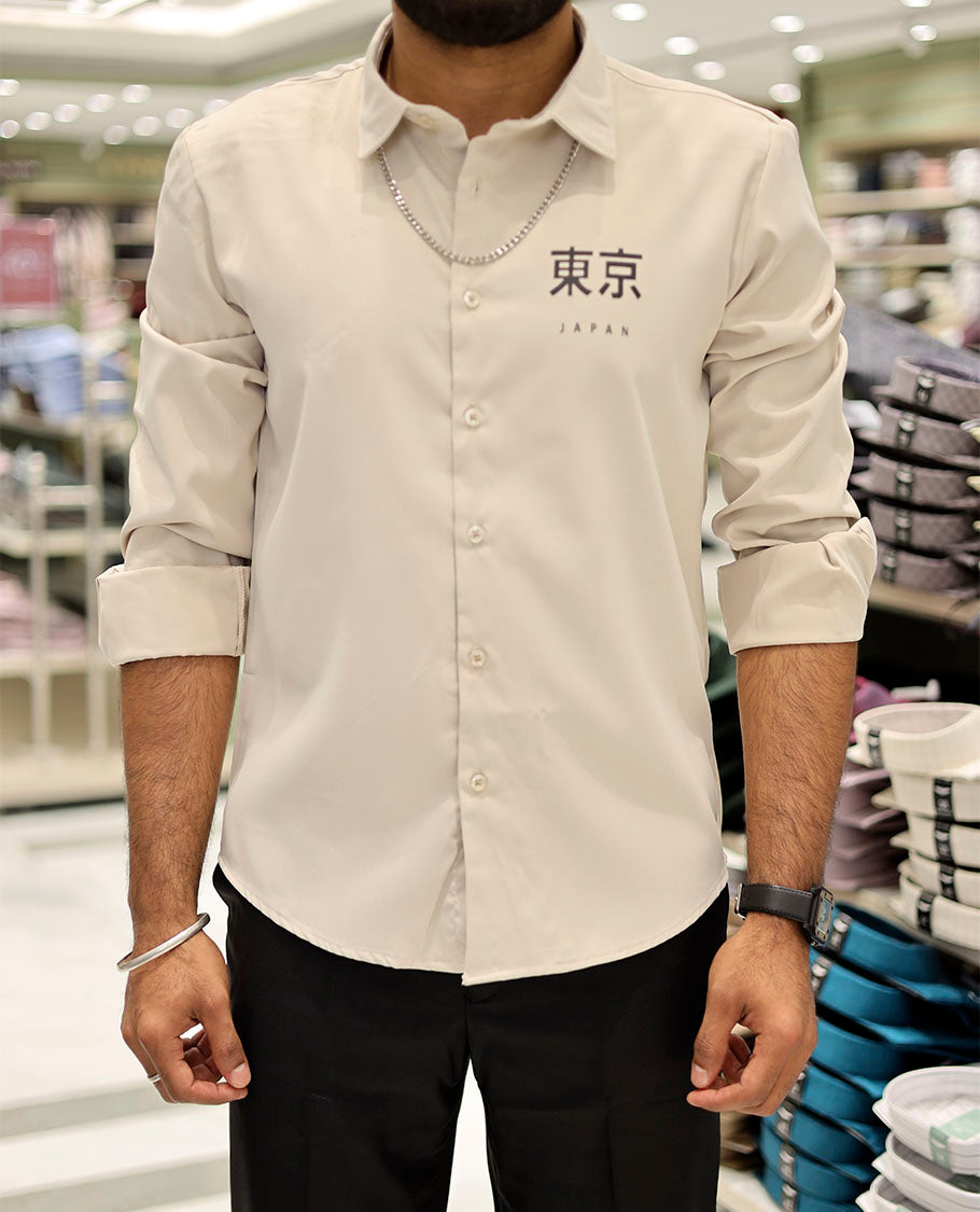 Cream Cotton-Blended Casual Shirt Features Typographic Print, Full-Sleeves, a Spread Collar, a Regular Fit, and a Regular Length