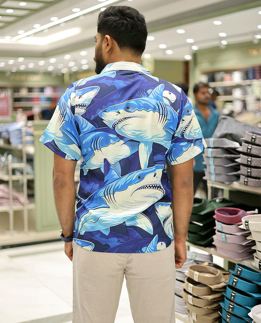 Multi-Color Poly-Blended Casual Shirt Features Pool of Sharks Print, Half Sleeves, a Poly Collar, a Regular Fit, and a Regular Length