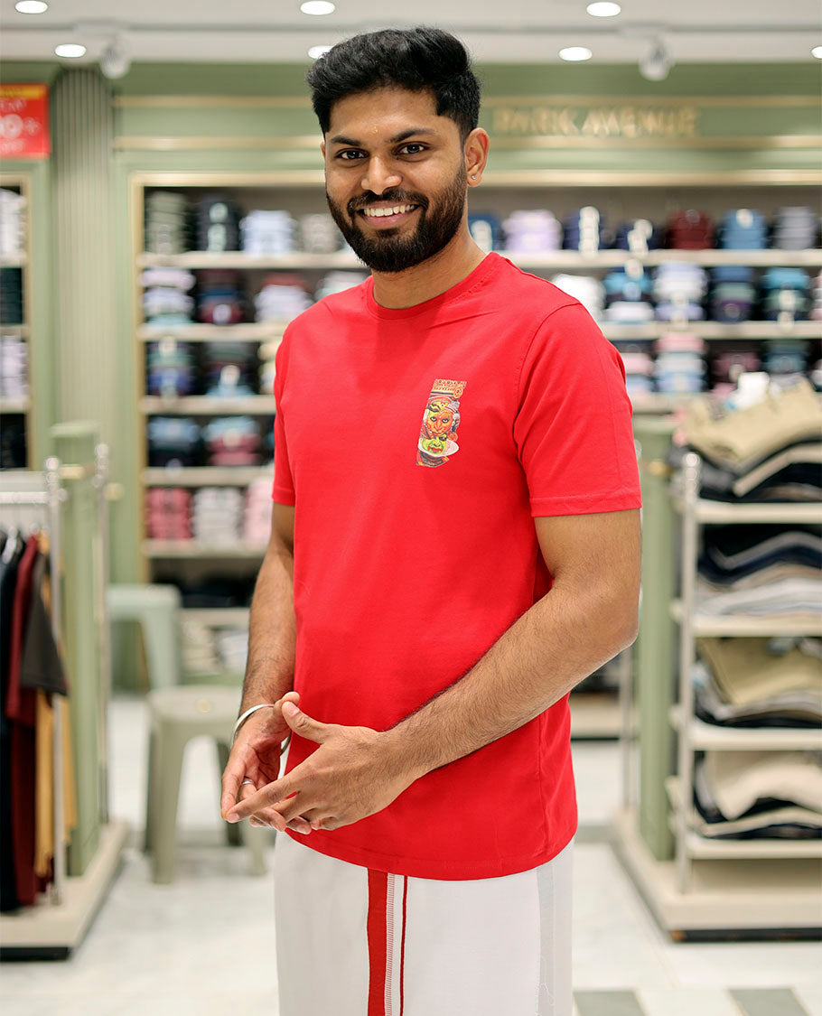Red Cotton-Blended T-Shirt Features Onam-Themed Kathakali Face Print, Half-Sleeves, a Round Neck, a Slim Fit, and a Regular Length