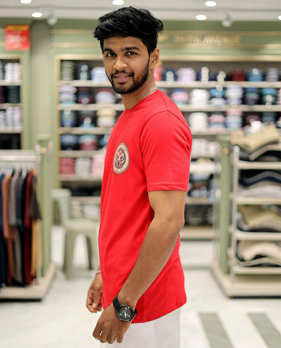 Red Cotton-Blended T-Shirt Features Onam-Themed Face Print, Half-Sleeves, a Round Neck, a Slim Fit, and a Regular Length