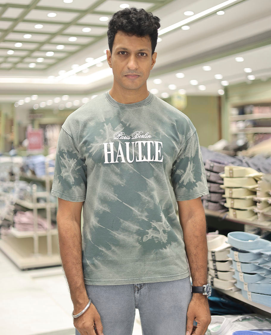 Green Cotton-Blended T-Shirt Features Typography Print, Half Sleeves, a Round Neck, an Oversized Fit, and a Regular Length