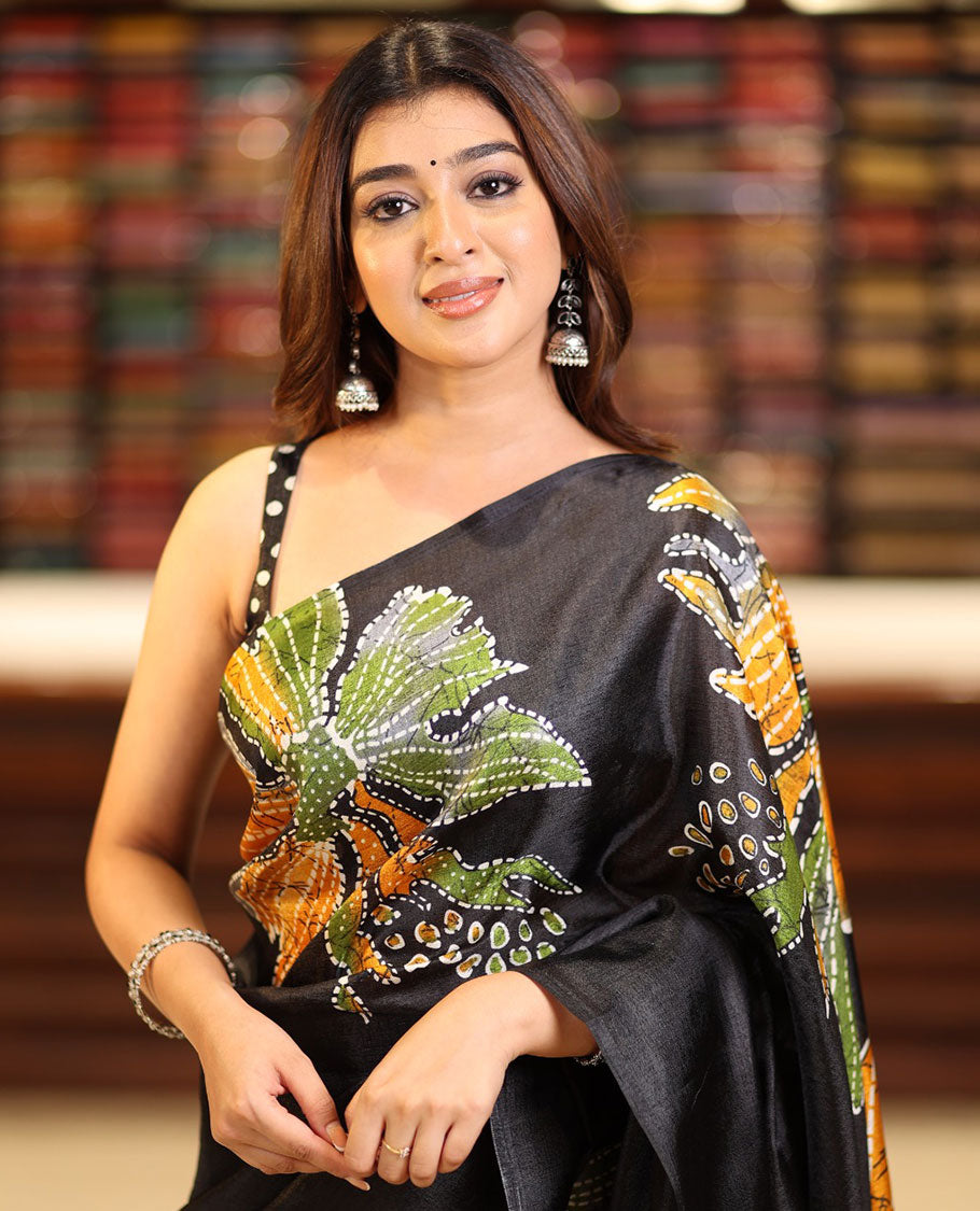 Borderless black printed orchid design semi khadhi saree with printed self, tussels pallu & all over dotted blouse