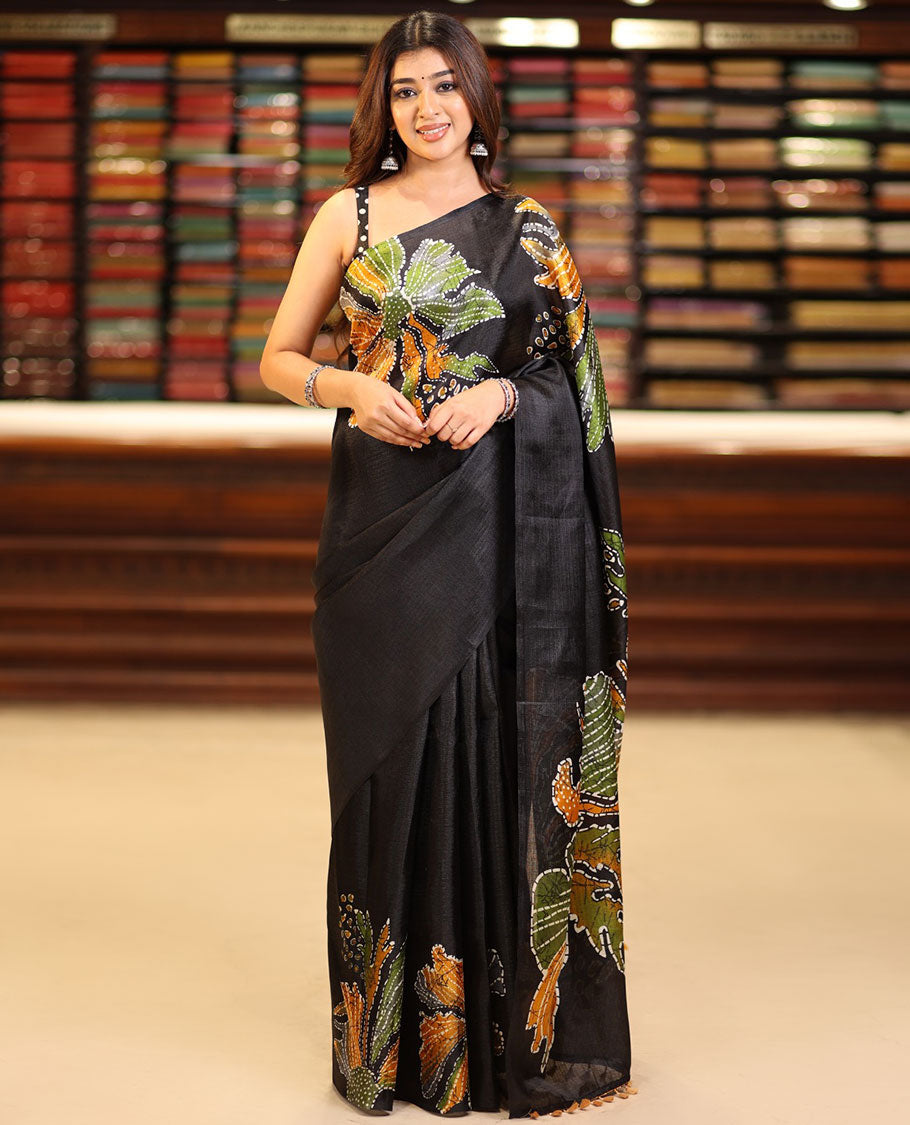 Borderless black printed orchid design semi khadhi saree with printed self, tussels pallu & all over dotted blouse