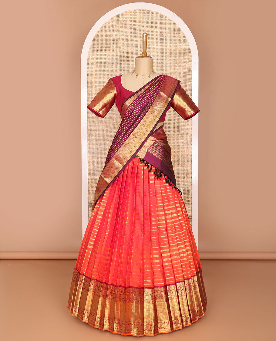 Orange striped readymade silk half saree with contrast intricate zari design border, floral design blouse & floral design dhavani