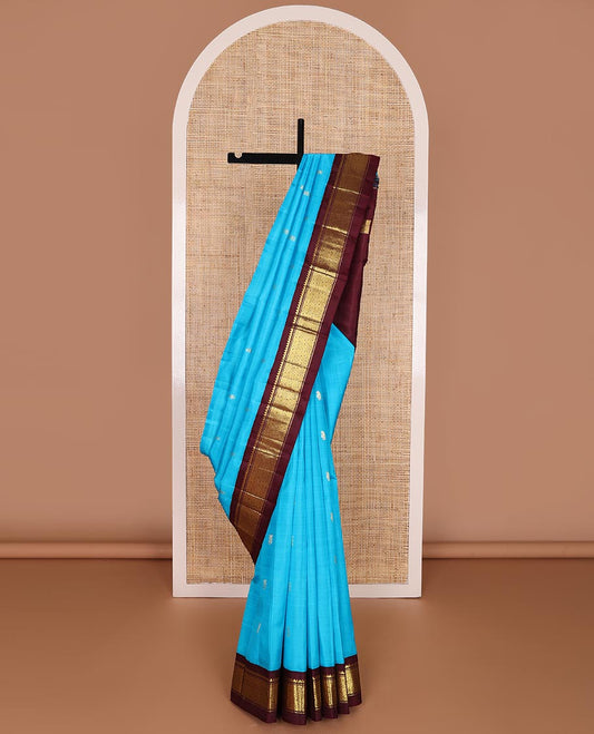 Blue buttas kancheepuram silk saree with contrast korvai border of thilakam mokku, banaras, checked design & zari design pallu