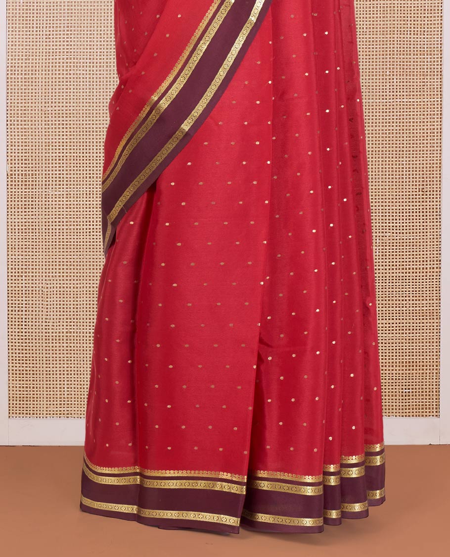 Apple Red Mysore Silk Saree Adorned with Small-Sized Buttas All Over Its Body, Complemented by a Contrast Rettai Pettu Border of Traditional Zari Designs, a Simply Sparkled Pallu of Zari Stripes, and a Contrast Blouse