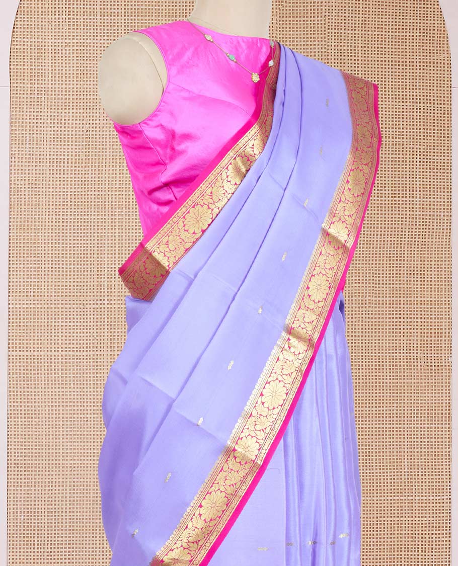 Lavender Mysore Silk Saree Ornamented with  Zari Buttas All Over Its Body, Complemented by a Contrast Border of Floral Zari Designs, a Subtly Sparkled Pallu of Zari Designs, and a Contrast Blouse