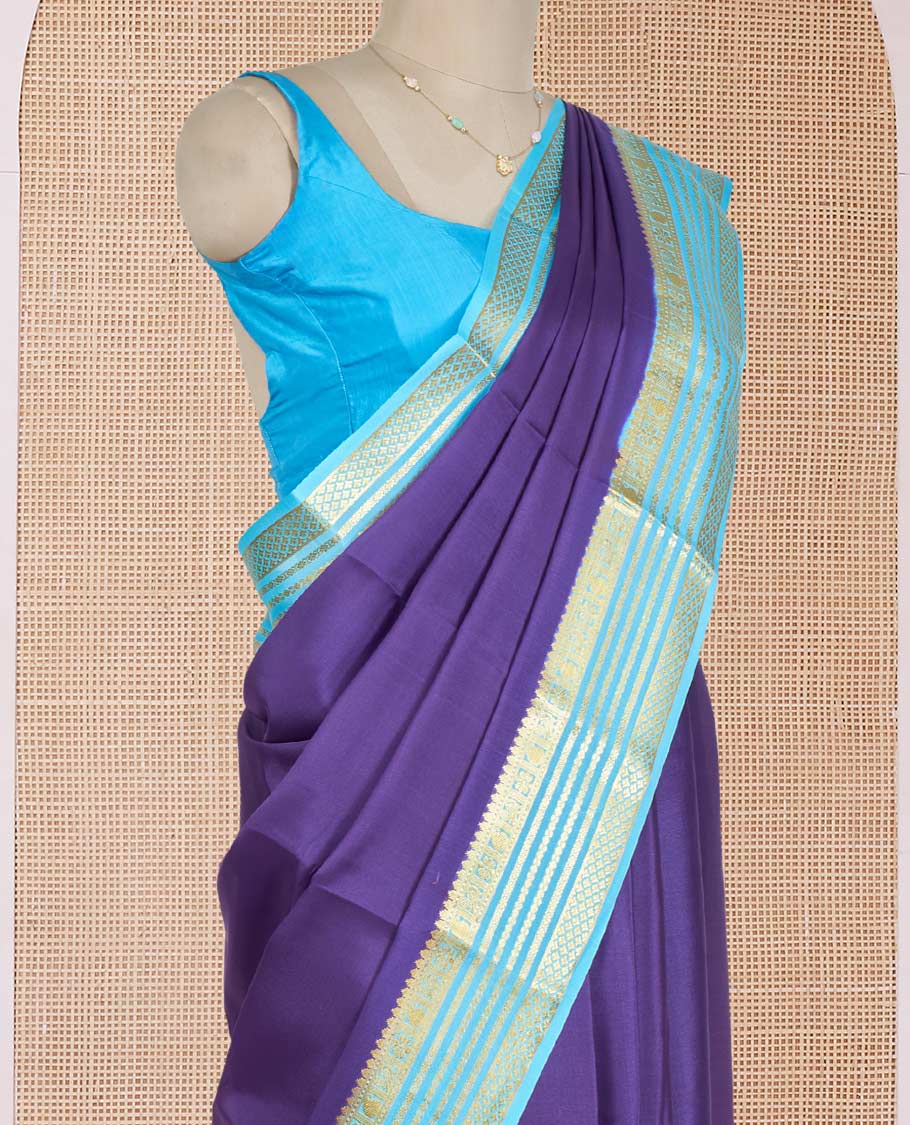 Blue Plain Mysore Silk Saree, Enthralled by a Contrast Varisai Pettu Border of Traditional Zari Designs, a Subtly Sparkled Pallu of Zari Stripes, and a Contrast Blouse
