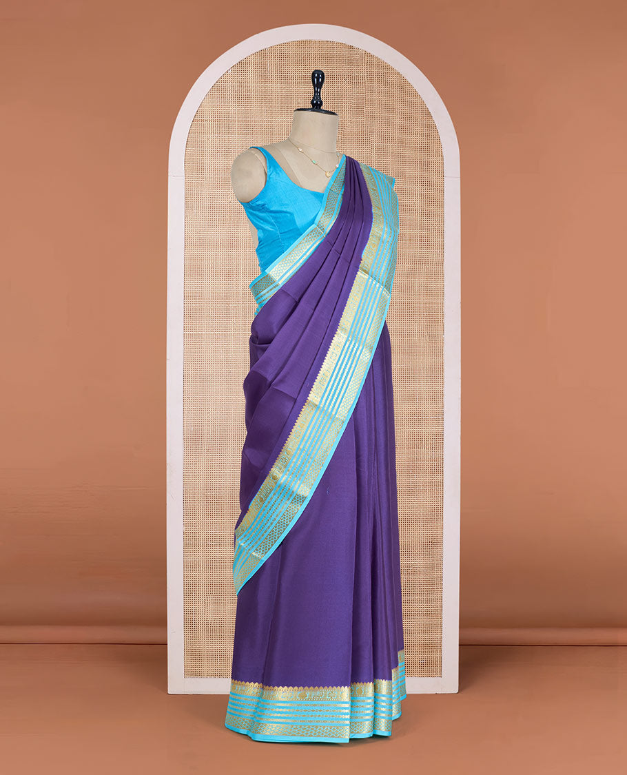 Blue Plain Mysore Silk Saree, Enthralled by a Contrast Varisai Pettu Border of Traditional Zari Designs, a Subtly Sparkled Pallu of Zari Stripes, and a Contrast Blouse