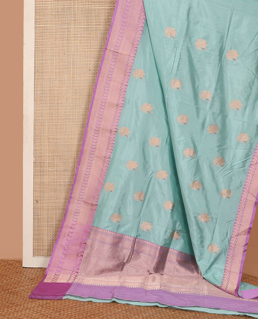 Blue zari swan buttas katan silk saree, contrast bird, and floral design border, and jaal pallu