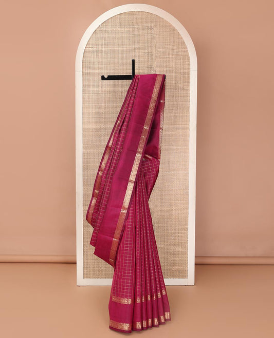Red checked Kanchipuram silk saree, rettai pettu border of rekku, and jada nagam, and pallu of manga mokku, annam chakram, and Navagunjara designs