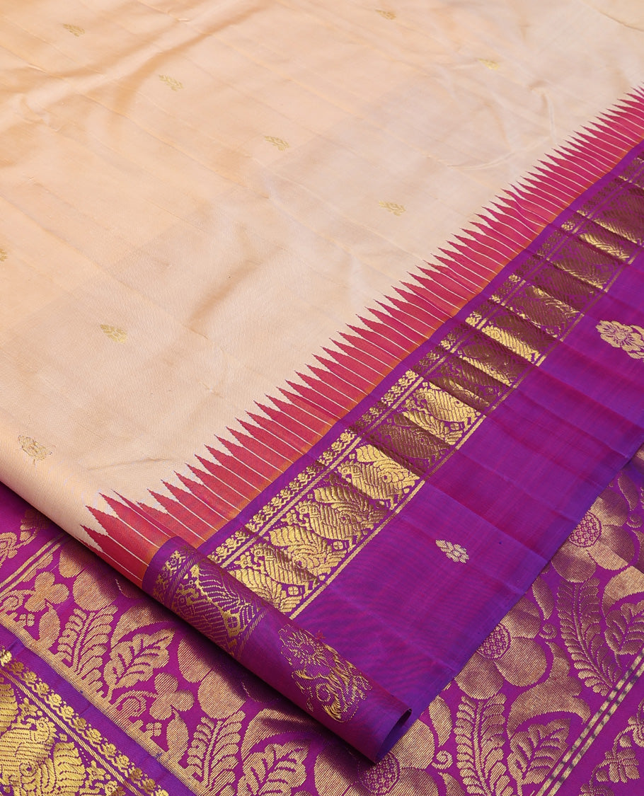 Sandal zari buttas Kanchipuram silk saree, contrast one-sided thazampoo rekku border of thilakam mokku and mayil zari motifs, and zari woven pallu