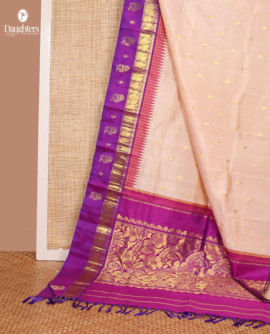 Sandal zari buttas Kanchipuram silk saree, contrast one-sided thazampoo rekku border of thilakam mokku and mayil zari motifs, and zari woven pallu