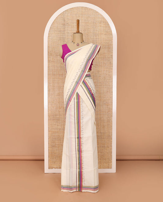 Cream plain Kerala mundu set with contrast multi-color striped border & micro-stone work
