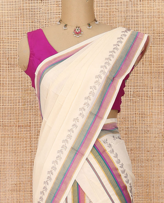 Cream plain Kerala mundu set with contrast multi-color striped border & micro-stone work