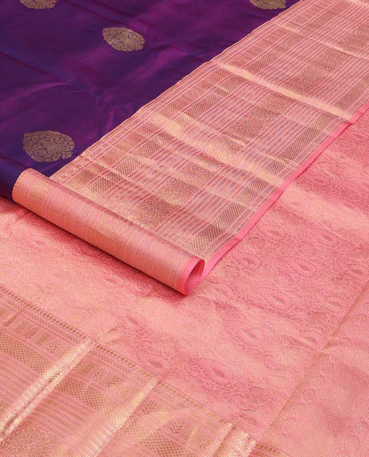 Violet silk saree with zari buttas, contrast border of thilakam mokku,kuyil kann, neli,muthu,banaras, and kodi visiry, and manga jaal pallu