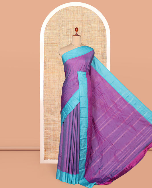 Violet Aarani Gift Saree, Woven with Zari Buttas on Its Body, Complemented by a Contrast Border, Pallu of Stripes, and Paired with a Matching Blouse