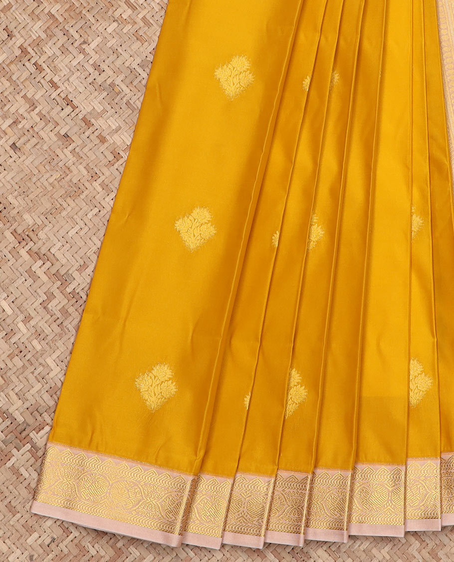 Yellow zari buttas budget silk saree, contrast border, and pallu of traditional zari designs