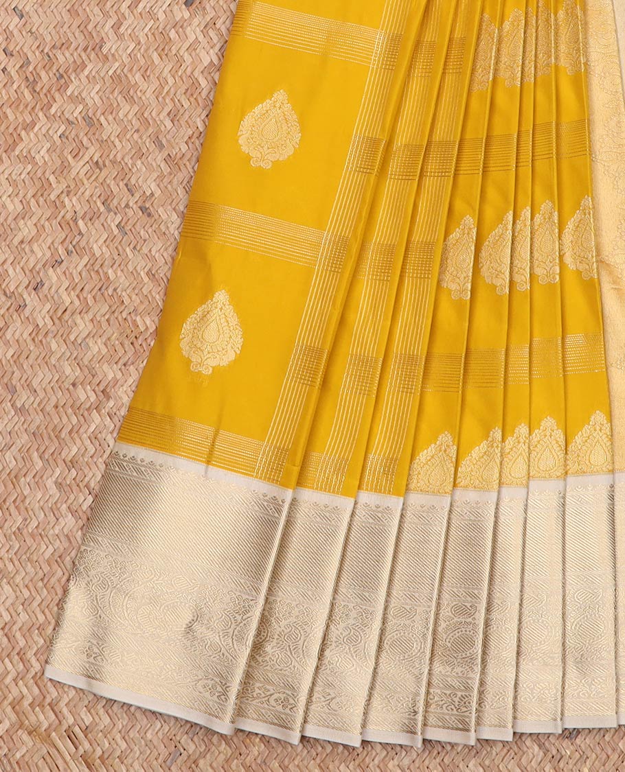 Yellow zari butta enclosed checked gift saree, contrast traditional zari border, and intricate pallu