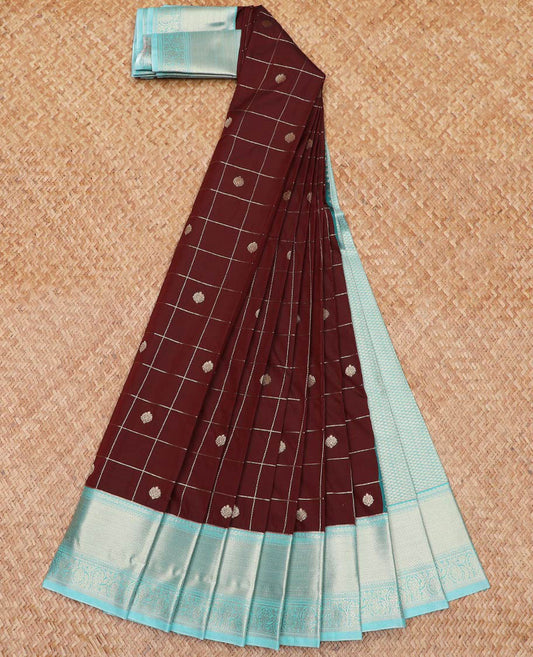 Maroon Budget Silk Saree Richly Detailed with Zari Butta Enclosed Checks, Complemented by a Contrast Traditional Zari Design Border, Subtly Designed Jaal Pallu, and Paired with a Contrast Blouse