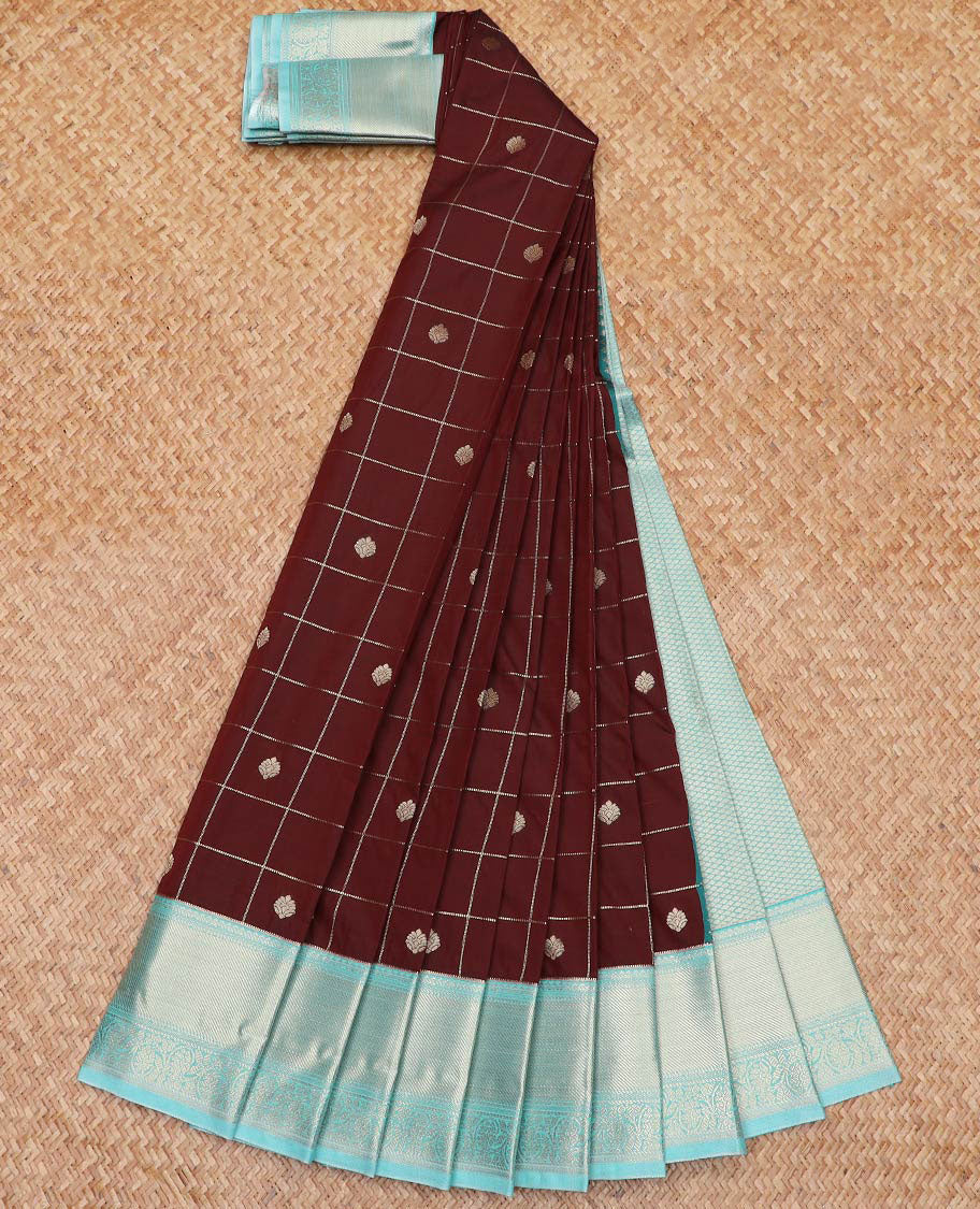 Maroon Budget Silk Saree Richly Detailed with Zari Butta Enclosed Checks, Complemented by a Contrast Traditional Zari Design Border, Subtly Designed Jaal Pallu, and Paired with a Contrast Blouse