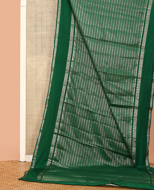 Green zig-zag stripes with polka dots zari woven assam silk saree, traditional motifs woven double border, and zari design pallu