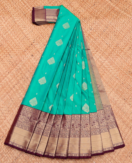 Green Budget Silk Saree, Adorned with Buttas, Complemented by a Contrast Traditional Zari Border, Grand Pallu, and Contrast Blouse