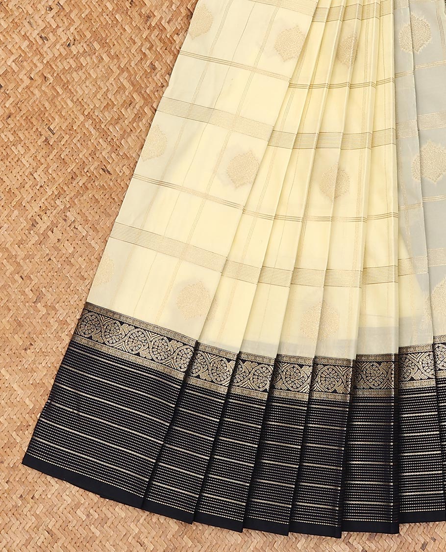 Cream butta enclosed checked gift saree, contrast traditional zari design border, and jaal pallu
