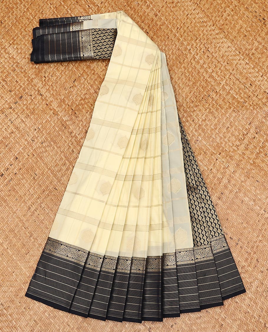 Cream butta enclosed checked gift saree, contrast traditional zari design border, and jaal pallu