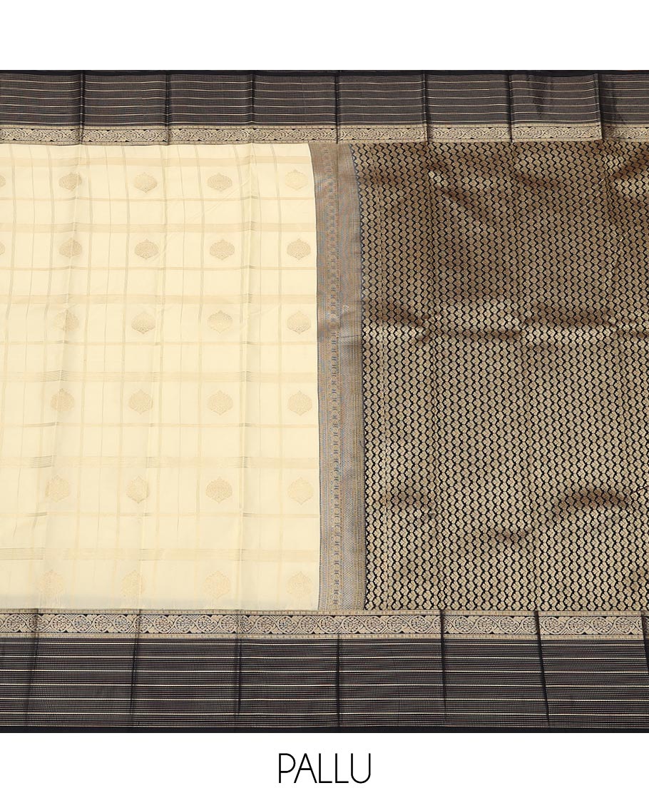 Cream butta enclosed checked gift saree, contrast traditional zari design border, and jaal pallu