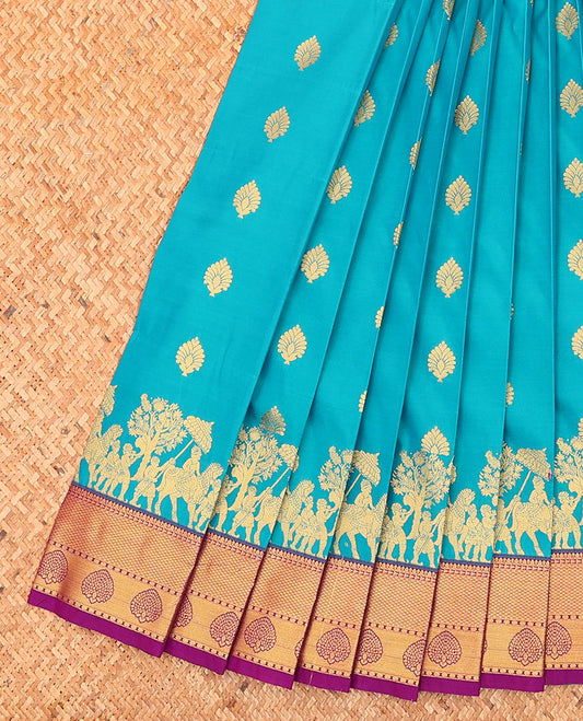 Blue buttas and human motifs budget silk saree, contrast traditional zari design border, and intricate pallu